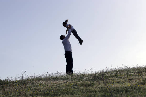 istock Father is playing with his daughter 1249225779