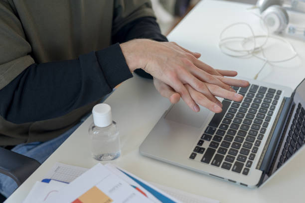 istock Applying sanitizer gel on hands 1249226948