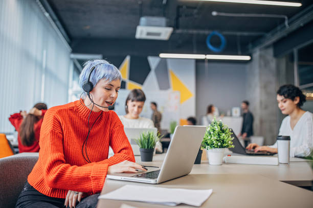 istock Woman working on laptop in modern office 1249227739