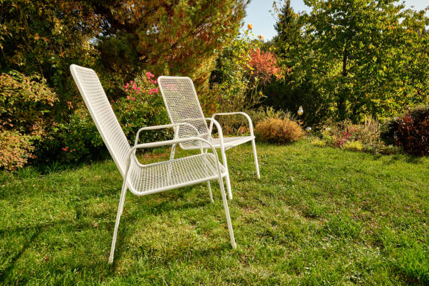 istock White garden chairs in idyllic sunny October garden 1249229552