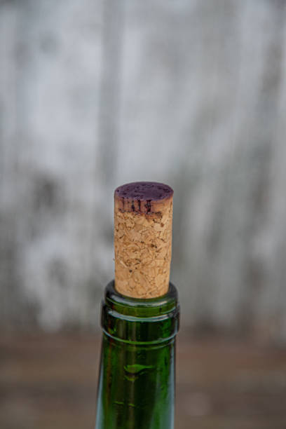 istock Old used wine bottle cork closeup for winery concept backdrop with copy space 1249231948