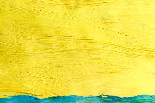 istock Abstract color background drawn with paints. Abstract background yellow and blue. 1249233523