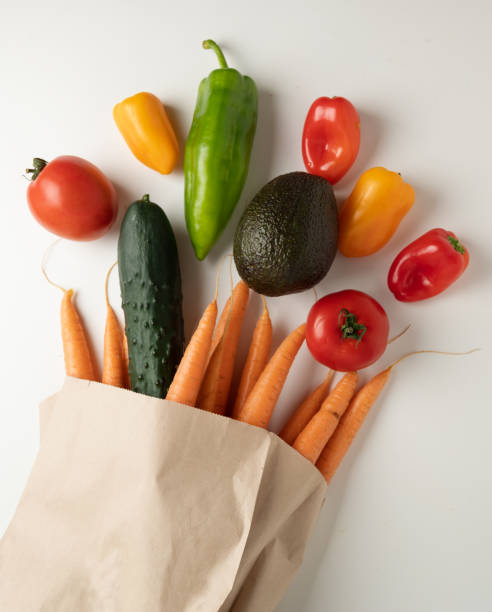 istock Fresh vegetables in recyclable paper bag 1249233815