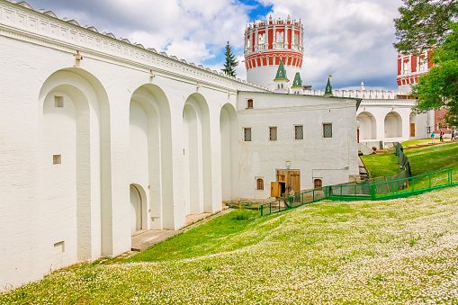 The wall of the historic Novodevichy Convent in Moscow Russia, a UNESCO World Heritage Site, on a sunny day.