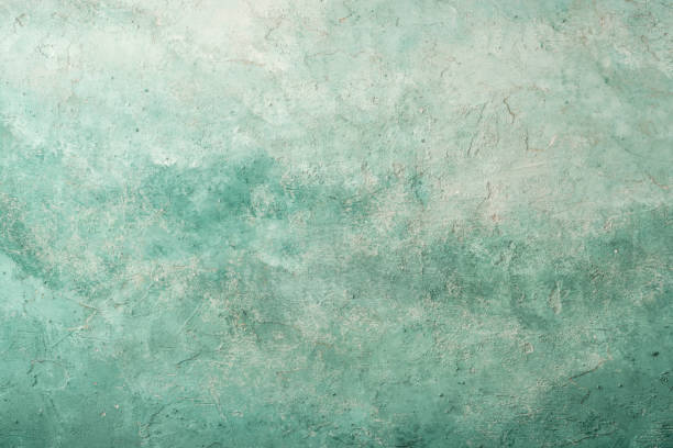 istock grungy stucco wall background painted with green and white 1249238113