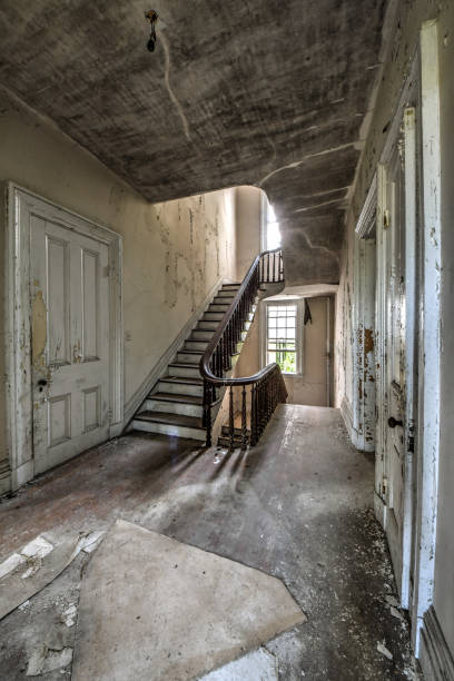 istock Grand staircase in an abandoned mansion 1249238118
