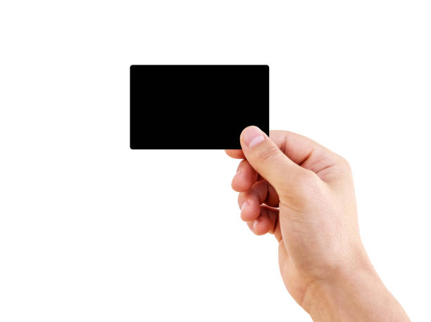 istock Man hand holding business card isolated. 1249238208