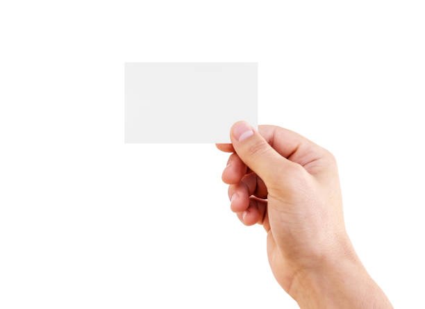 istock Man hand holding business card isolated. 1249238215