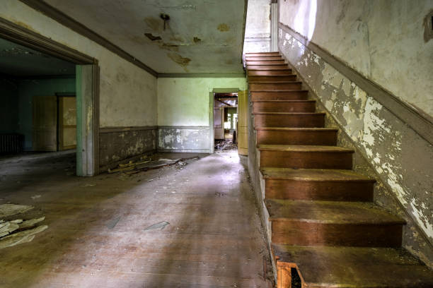 istock Staircase and entry way in Abandoned House interior 1249245394