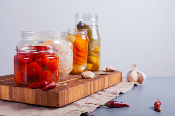 istock Fermented vegetables in jars on the table 1249247856