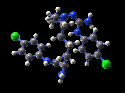 A molecular model of the drug chlorhexidine. It is used as a disinfectant and antiseptic before surgery, as well as for cleaning wounds and as a mouthwash. Black background.