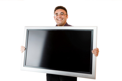 Man holding in hands lcd tv isolated over white background
