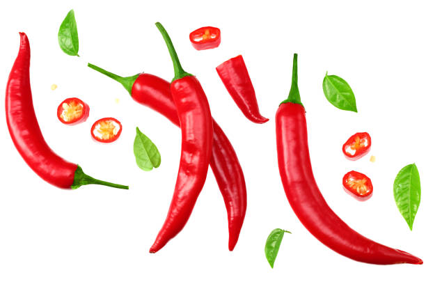 istock sliced red hot chili peppers isolated on white background top view 1249257727