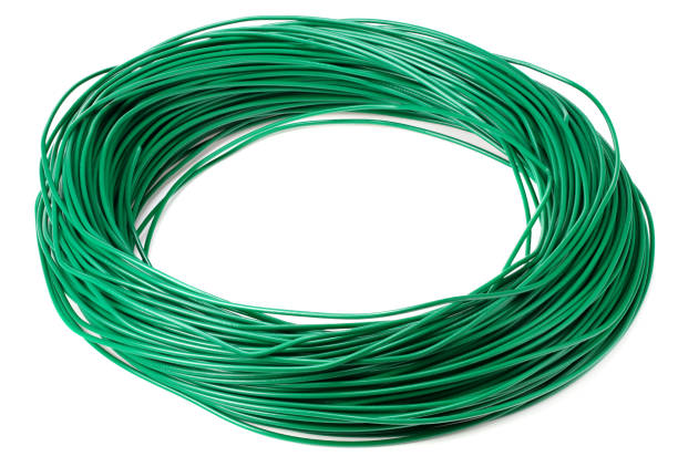 istock green electric cable isolated on white background. electrical wire 1249257934