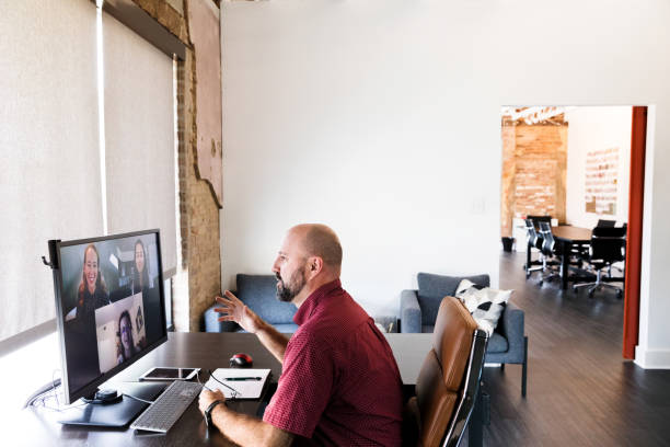 istock Businessman participating in virtual meeting 1249259961