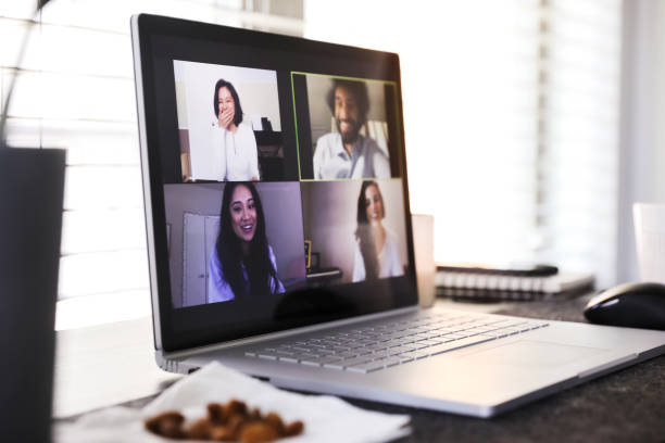 istock Person using laptop to video chat with friends 1249260026