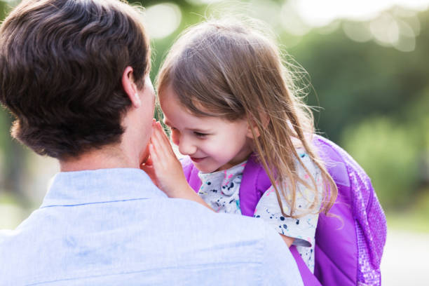 istock Unrecognizable father and young daughter share sweet moment 1249260063