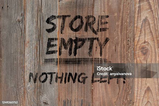 Text Store Empty Nothing Left Painted Black On Wooden Boards Boutique Shops And Stores Boarded Up Concept Background With Text Protests Riots And Looting In New York City Stock Photo - Download Image Now