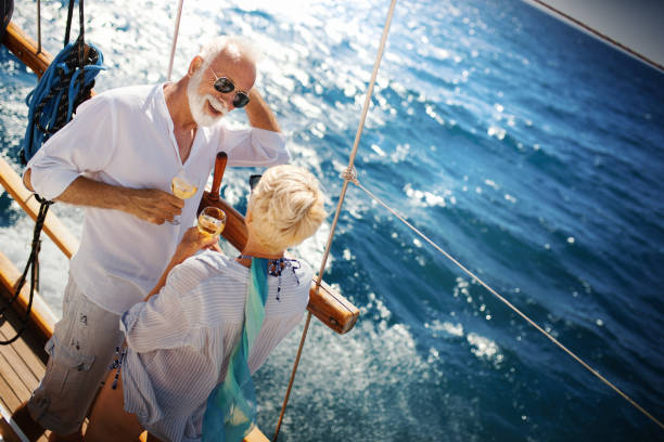 istock Senior couple on a sailing cruise 1249263348