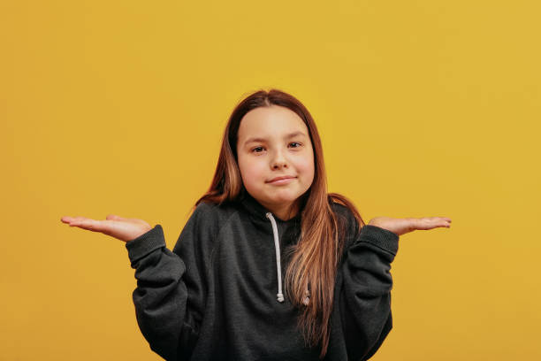 istock The girl is confused and does not know how to handle this situation. 1249265164