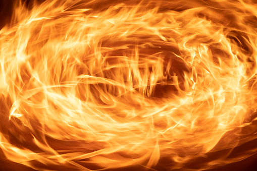 Flames in a circle. Horizontal Motion blurred fire.  long exposure