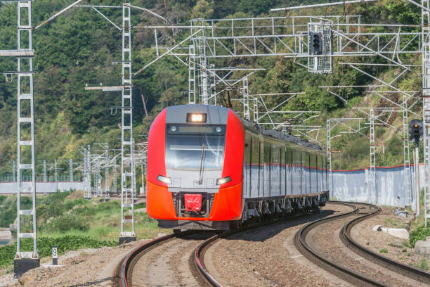 istock Passenger train moves by the mountain. Sochi. 1249276507