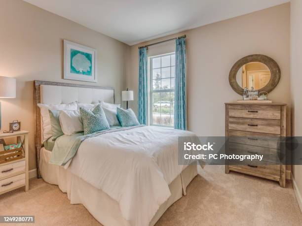 Bedroom With Turquoise Accents Stock Photo - Download Image Now - Bedroom, Curtain, Carpet - Decor