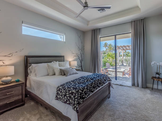 istock Trendy bedroom with easy access to back patio 1249282672
