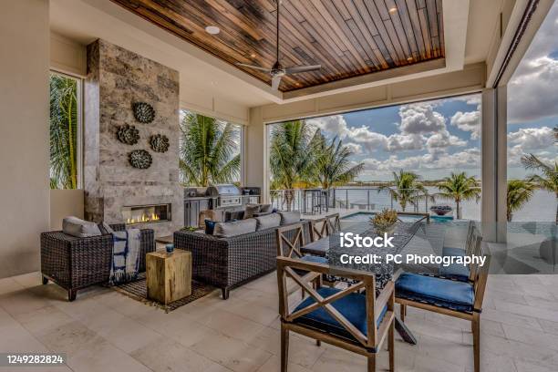 Outdoor Patio With Living And Eating Area Stock Photo - Download Image Now - Beach House, Outdoors, Patio