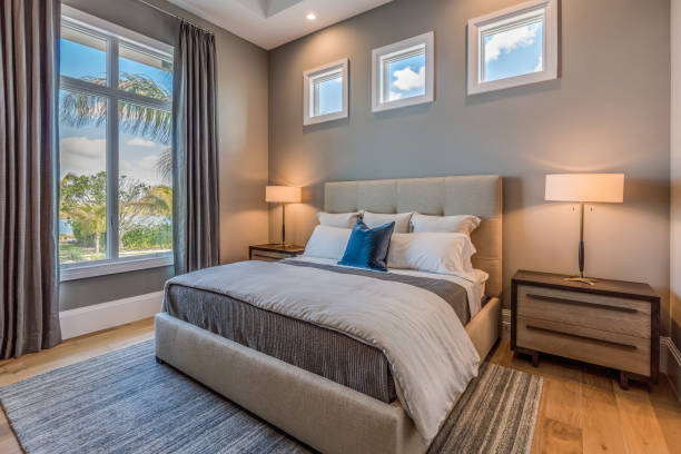 istock Modern bedroom with wood floor and rug 1249282831