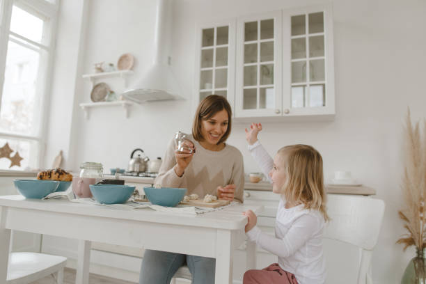 istock A young mother spends time with her little daughter at home. 1249282939
