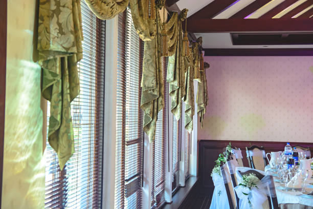 istock Spacious windows with jalousie and curtains 1249283112