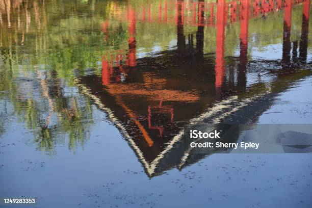 Australia Cairns Lake Reflection Of The Zhanjiang Pavilion Stock Photo - Download Image Now