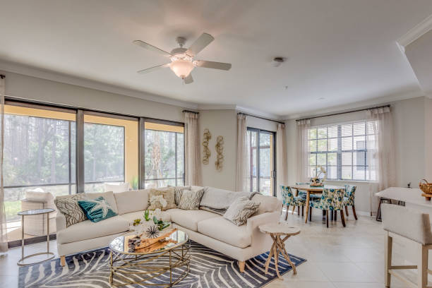 istock Open floorplan with view of sunroom from family room 1249284473