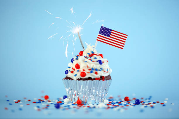 istock 4th of July cupcake with flag and sprinkles 1249284530