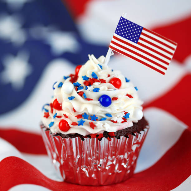 4th of July cupcake with flag and sprinkles