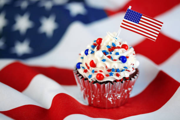 istock 4th of July cupcake with flag and sprinkles 1249284617