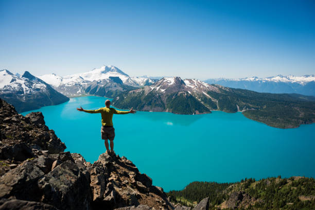 istock Man exploring natures beauty on a hike 1249287280