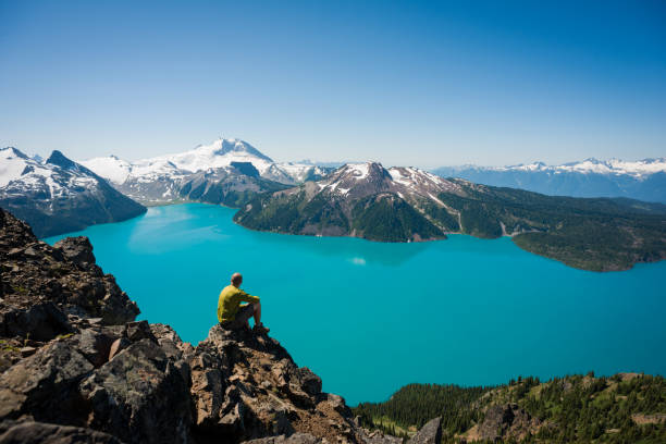 istock Man exploring natures beauty on a hike 1249287288