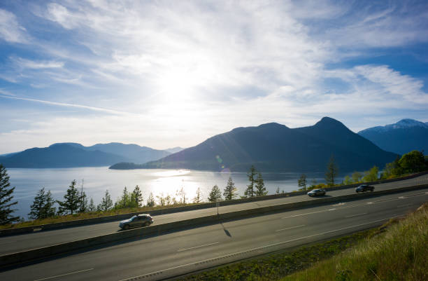 Traffic along a scenic highway Highway 99 from Vancouver to Whistler vancouver canada photos stock pictures, royalty-free photos & images