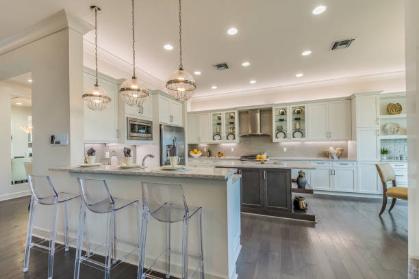 istock Luxury kitchen with double island and beautiful pendant lights 1249289108