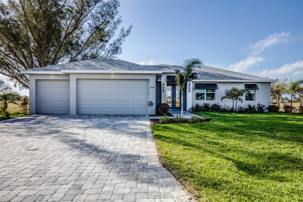 istock Front exterior of new luxury home 1249289163