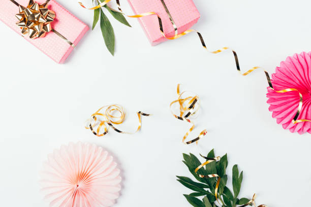 istock Pink gift boxes, paper birthday party decorations 1249289236