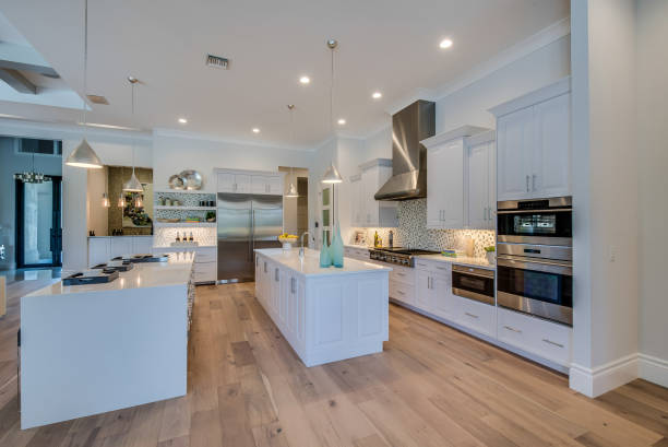 istock Large spacious kitchen with stainless steel appliances 1249292246