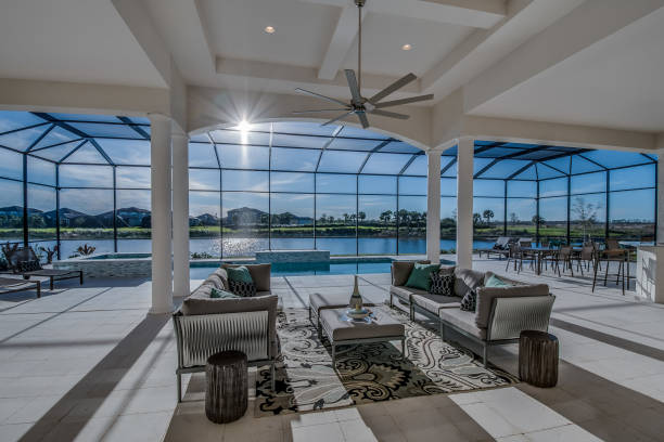 istock Extremely spacious covered back patio near large pool 1249292351