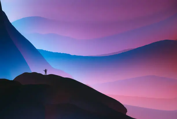 Photo of young man standing on top of the mountain