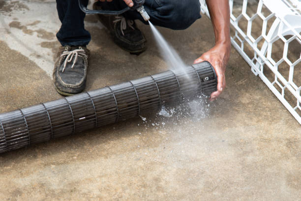 istock Cleaning air conditioner by water for clean a dust 1249305389