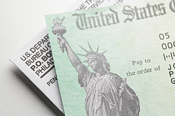 Stimulus Check: USA government check, payment Stimulus Check: USA government check, payment refund stock pictures, royalty-free photos & images