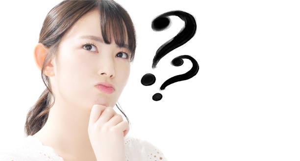 young asian girl having questions. - japanese girl imagens e fotografias de stock