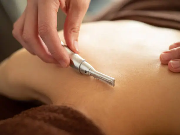 Photo of Woman shaving nape before hair removal